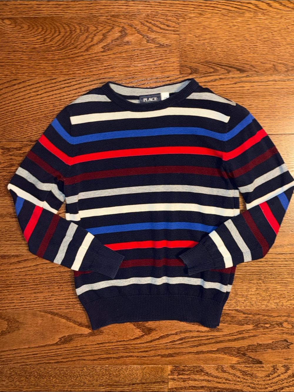 Size 7-8/M boys striped crewneck sweater.